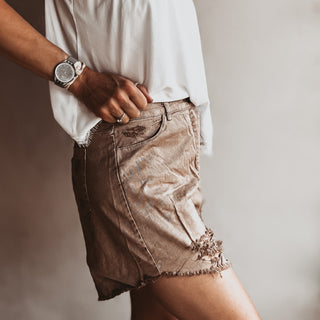Distressed tan shorts