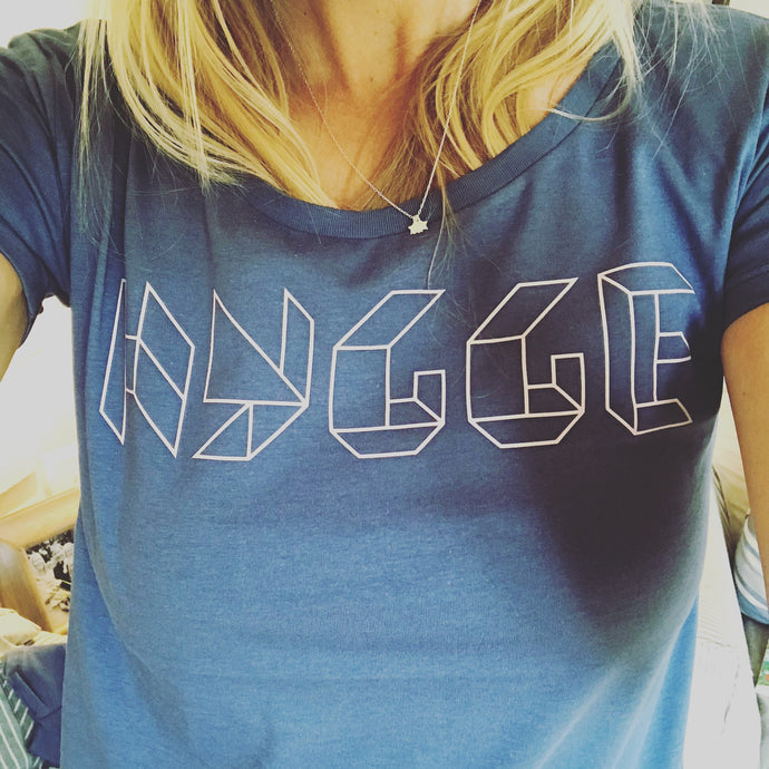 Hygge triangle font pink on denim blue tee