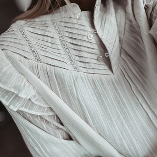 Loryn smocked white linen blouse