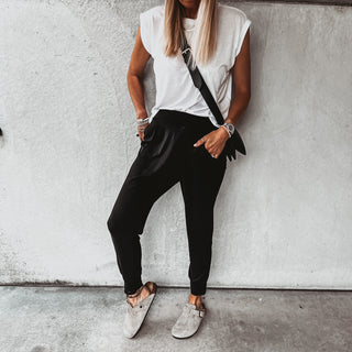 Black jersey Geraldine crepe crossover harem joggers