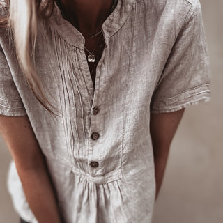 Sand Scarlet smocked white linen blouse