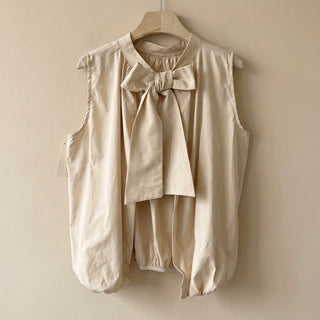 Bella cream with bow on back *NEW*