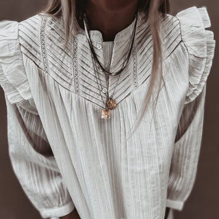 Loryn smocked white linen blouse