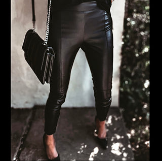 Assos black faux leather skinny pants