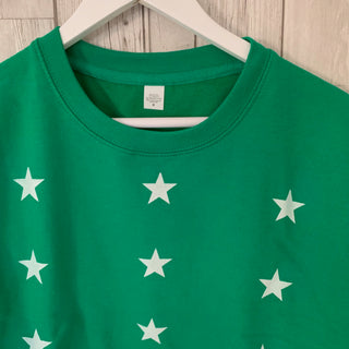 Green sweatshirt with white stars