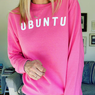 White UBUNTU on bright pink sweatshirt