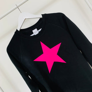Neon pink star jet black sweatshirt *now half price*