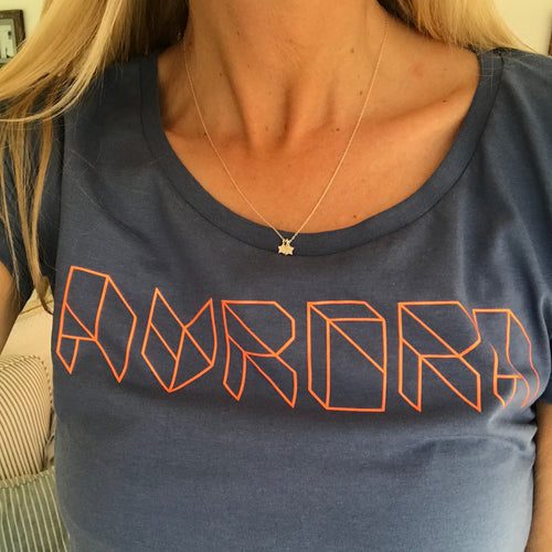Neon orange Aurora triangle font on denim blue tee