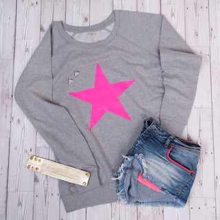 Neon pink star on light grey sweat