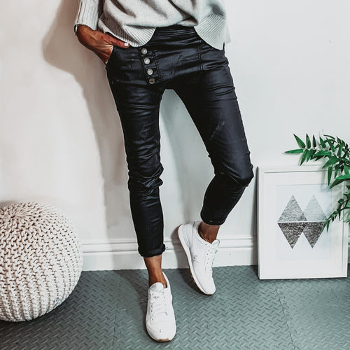 Brixton black faux leather jeans with asymmetric waist detail