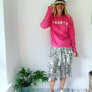 White UBUNTU on bright pink sweatshirt