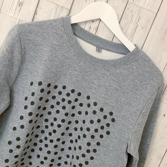 Black dots on grey charcoal sweatshirt