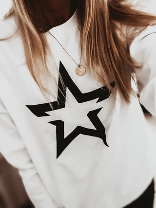 White sweatshirt with a striking black star *boyfriend fit*