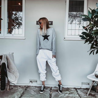 Black star on grey sweatshirt