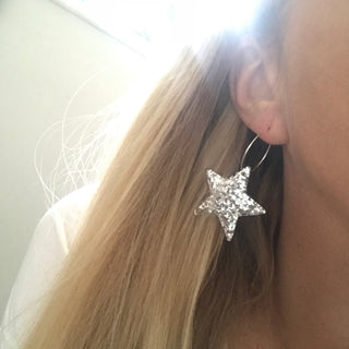 Large silver glitter star hoop earrings
