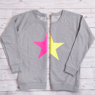 Neon pink star on light grey sweat