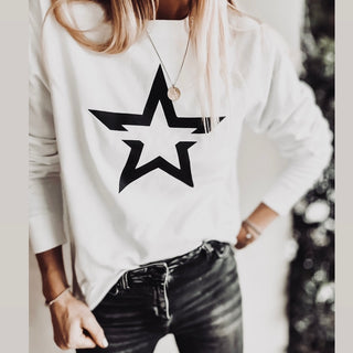 White sweatshirt with a striking black star *boyfriend fit*