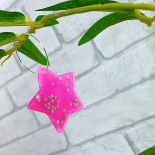 Pink glitter star earrings