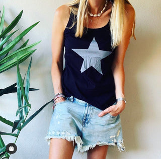 Silvery grey star on black vest top