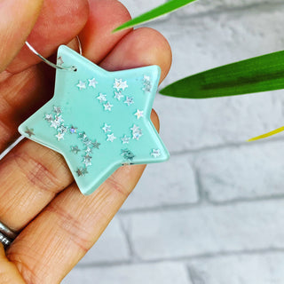 Mint glitter star earrings