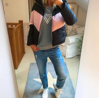White triangles on light grey sweat