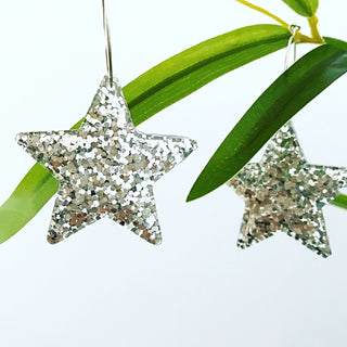 Large silver glitter star hoop earrings