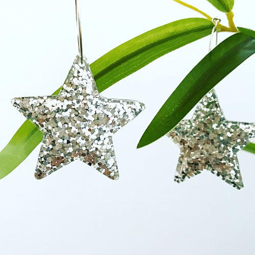 Large silver glitter star hoop earrings