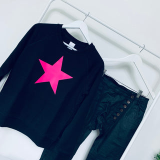 Neon pink star jet black sweatshirt *now half price*