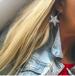 Large silver glitter star hoop earrings