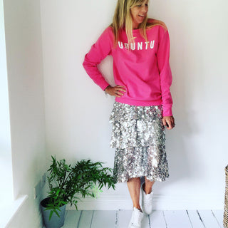 White UBUNTU on bright pink sweatshirt