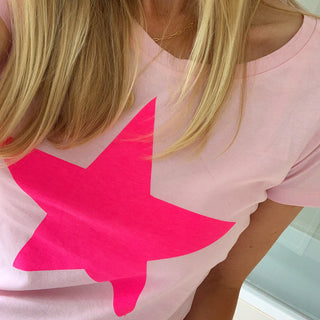 Neon pink star on pink tee