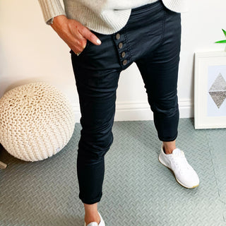 Brixton black faux leather jeans with asymmetric waist detail