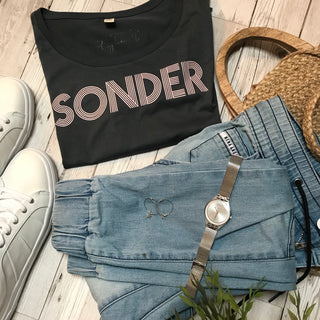 Pink SONDER on charcoal blue tee