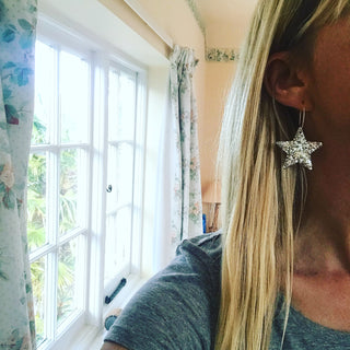 Large silver glitter star hoop earrings