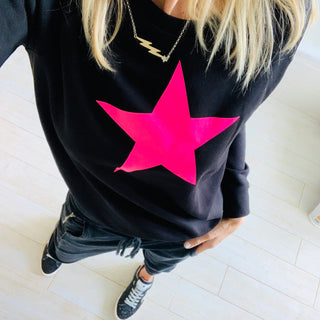 Neon pink star jet black sweatshirt *now half price*