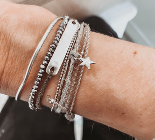 Little silver star bracelets